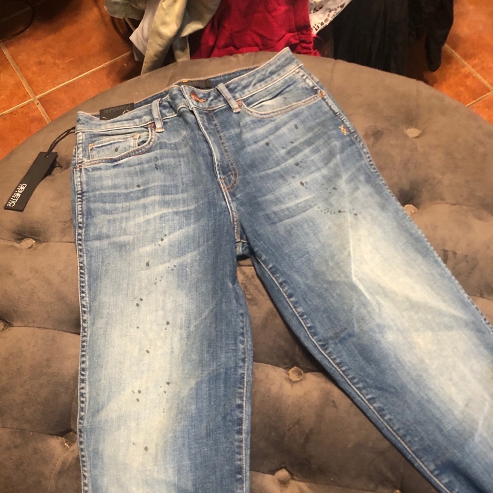 Jeans with blue splotches